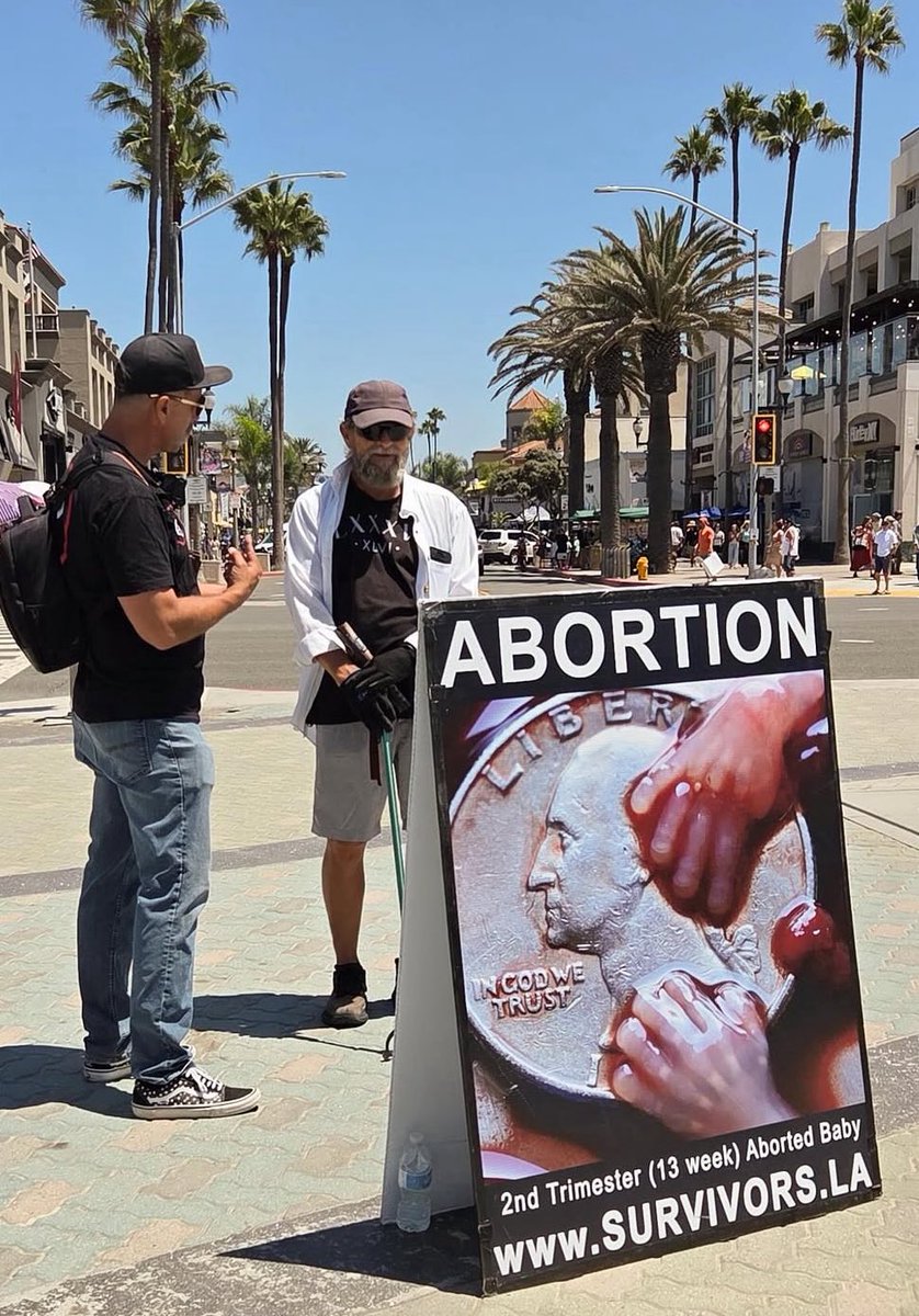 The <a href="/TheSurvivors_US/">Survivors</a> educating people at the Huntington Beach Pier.