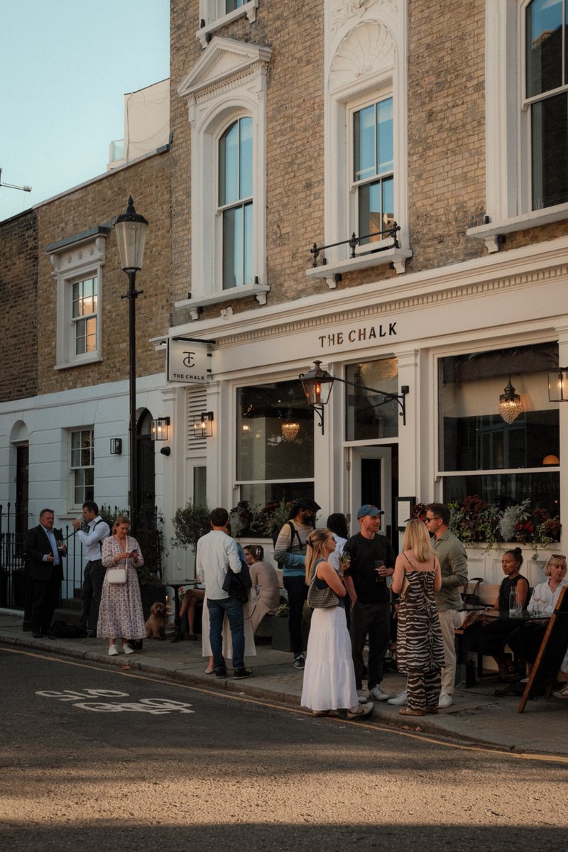 One of my favorite nuances of London is how people just hang in front of pubs with their drinks when the weather is nice.