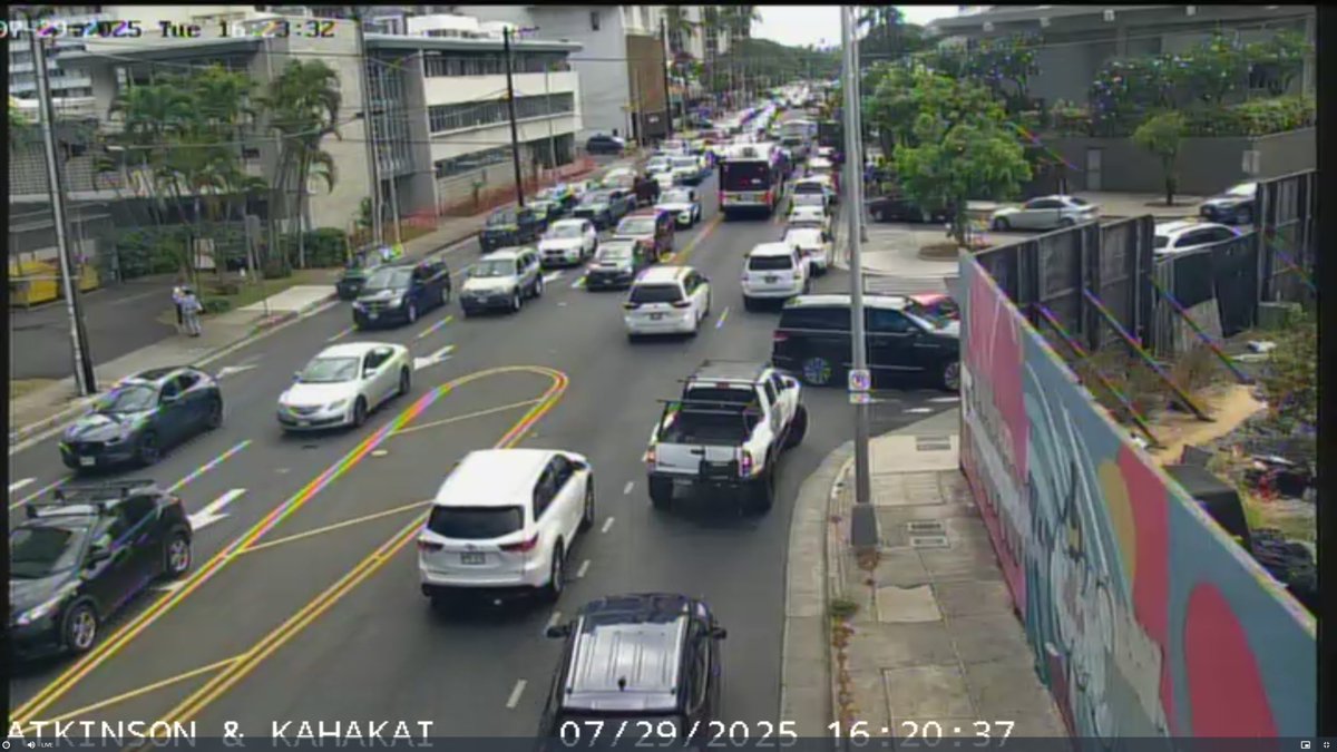 Bumper to bumper traffic jam ongoing in Honolulu Hawaii as residents/visitors seek higher ground in response to the Tsunami Warning in effect.