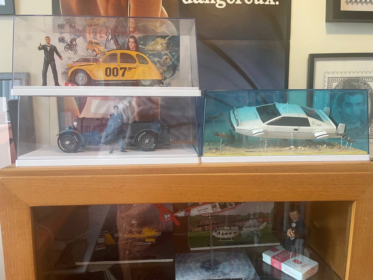I recently acquired this lovely midcentury display cabinet as a new home for my Bond models. We're currently at 16 so I'm a way off building one for each film...