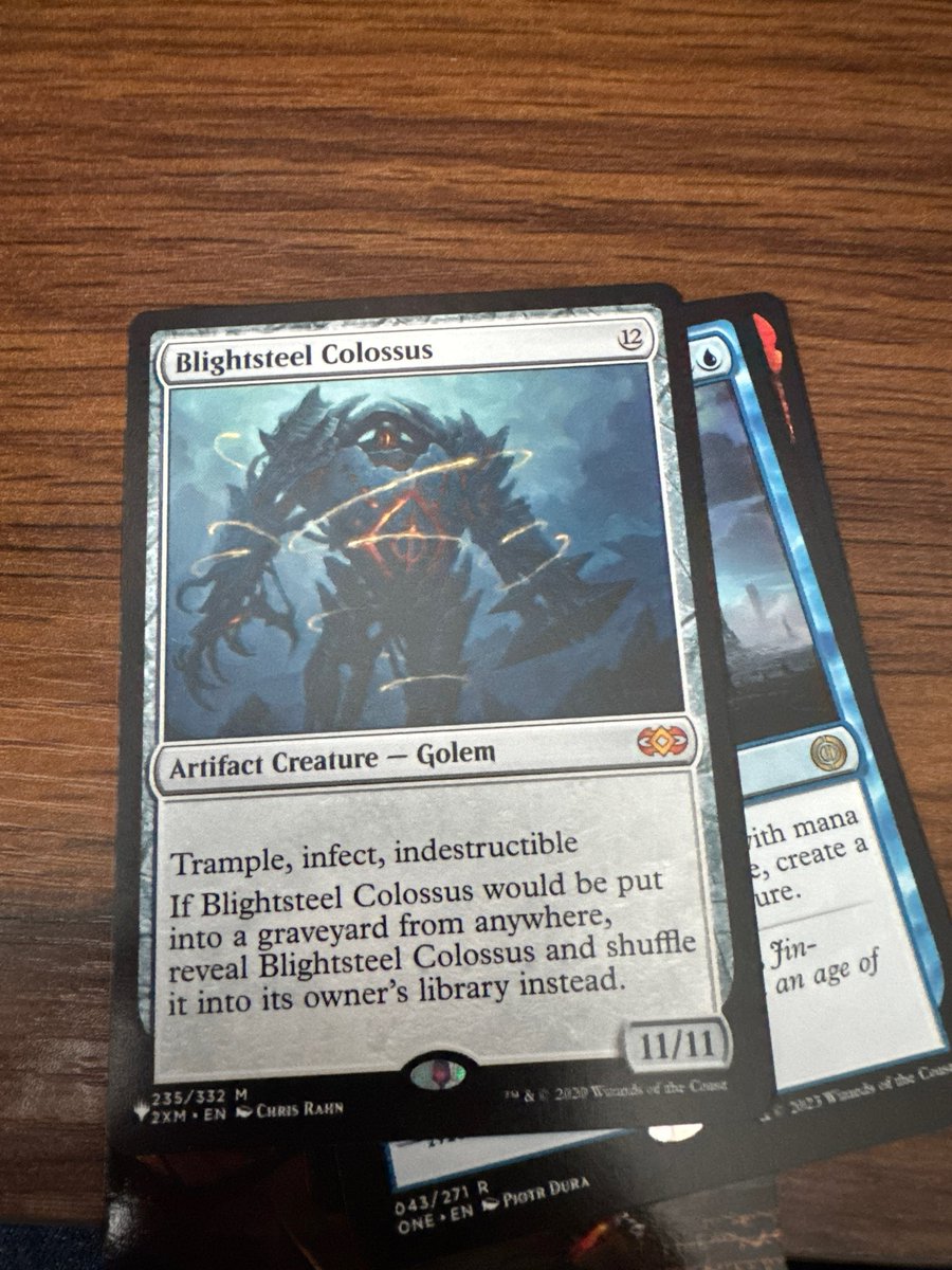 Had a forgotten phyrexia mtg pack in my room 
Hello blightsteel colossus, I wasn’t expecting guests