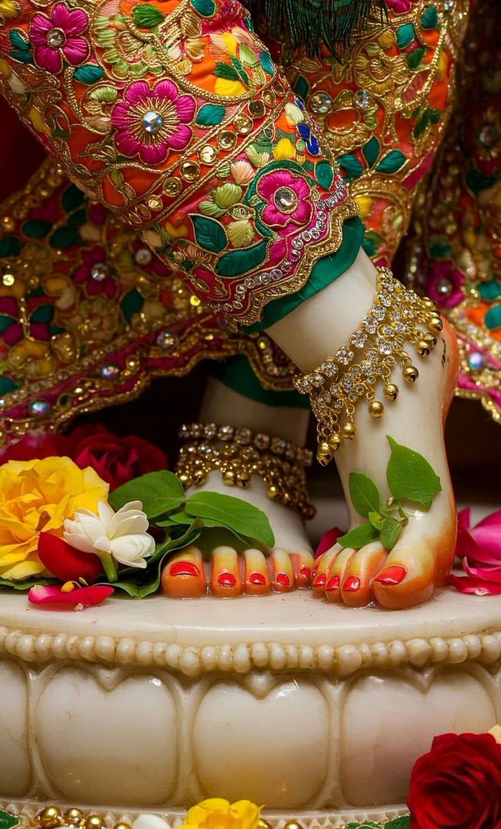 Touch shree Krishna's lotus feet with this 🙌 emoji