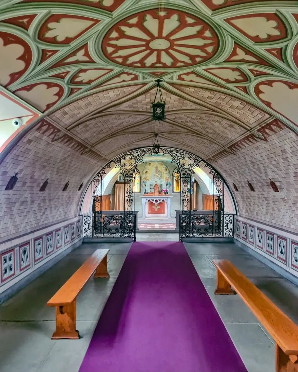 It's the interior that's impressive though, the men were lucky to have the artist Domenico Chiocchetti amongst them.

He created the painting of the Virgin Mary based on a prayer card his mother had given him before heading off to war.