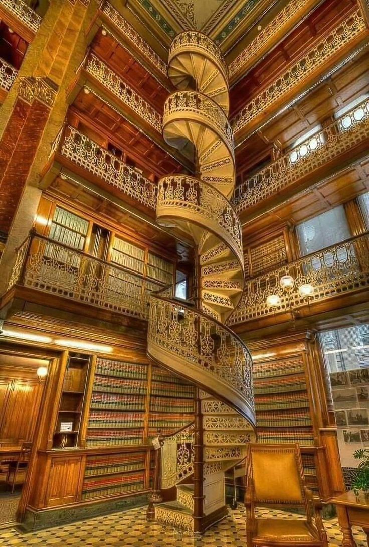 The ornate spiral staircase within the State Capitol Law Library in Des Moines, Iowa.