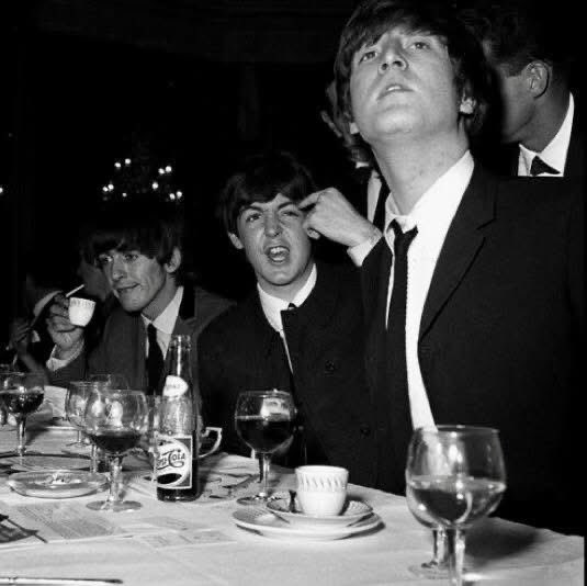 Celebrating their achievements at the Variety Club Luncheon at the Dorchester Hotel, London, March 1964. George seems happy with his cup of tea. Wonder what the others are drinking ?