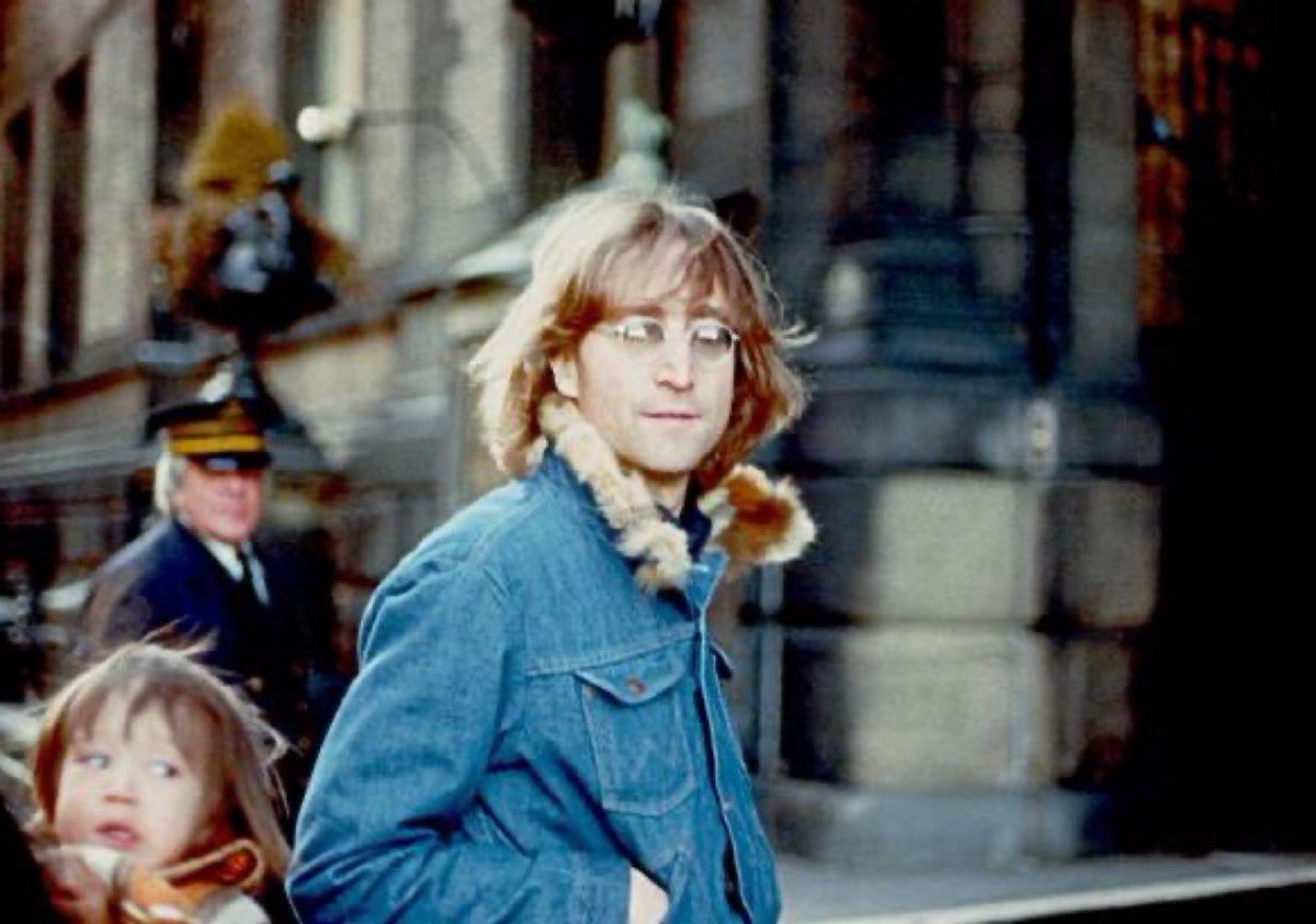 John & Sean Lennon outside the entrance to The Dakota building