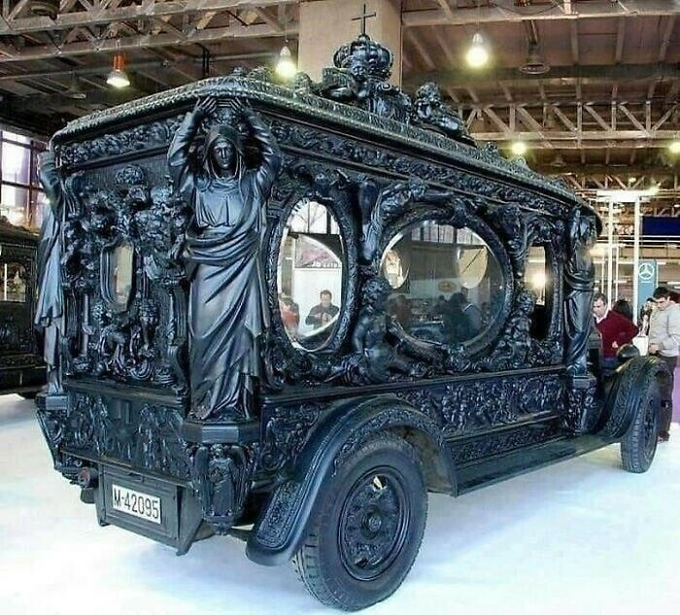 10. 1920s hand-carved hearse