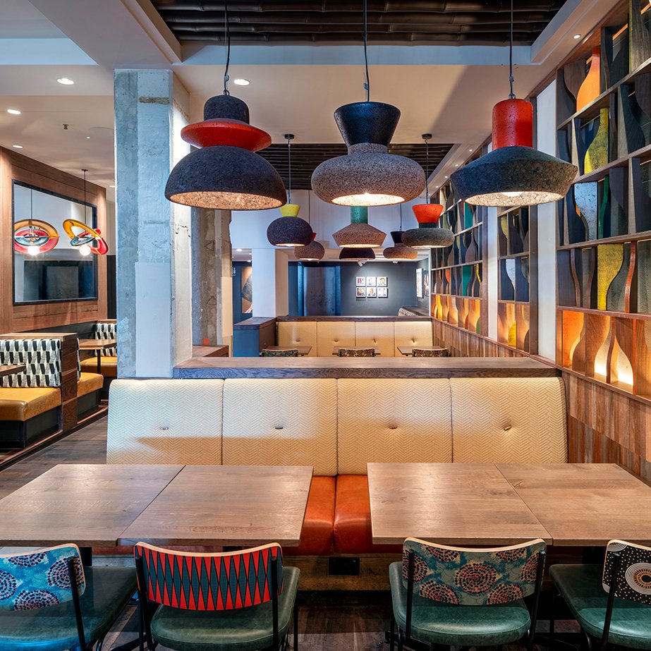 The newly refurbished <a href="/NandosUK/">Nando's</a> at the Brunswick Centre has been reimagined by Fusion dna to have a fiery hot #design inside &amp; a relaxed oasis of a space outside. I was commissioned to #photograph &amp; capture the design of the space inside &amp; out. #ThisIsThePlace #nandos #designer