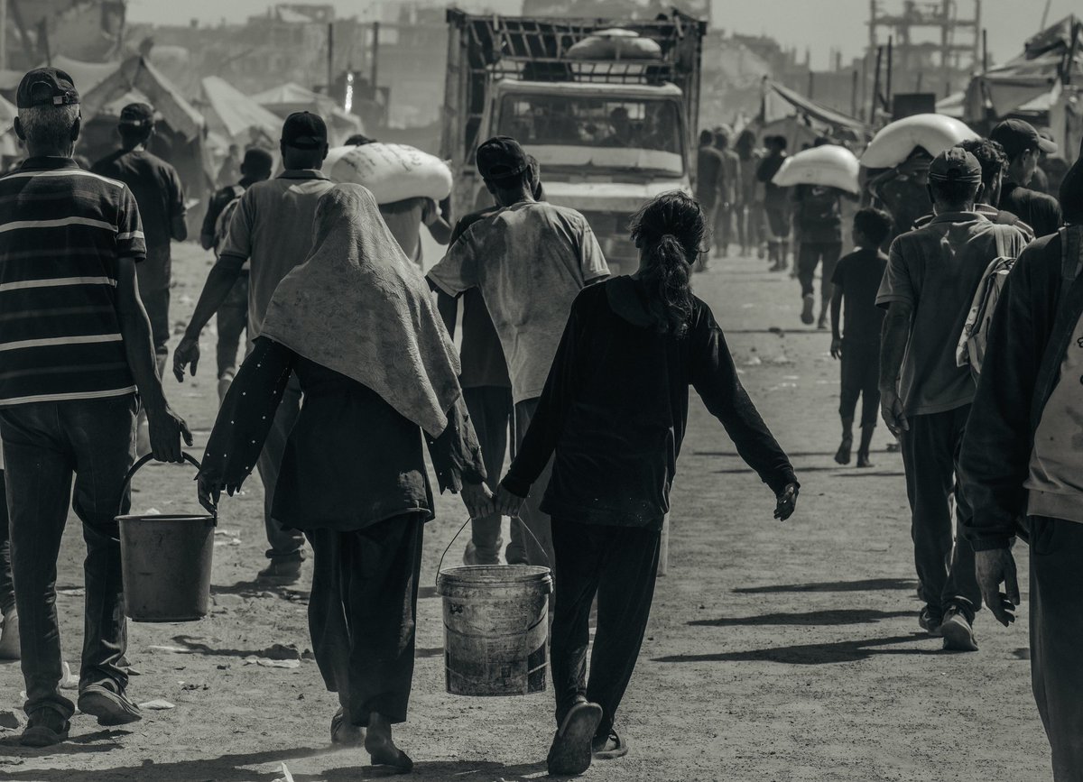 The road to flour was walked by everyone… people starving to death before dying from the bombs.
Every step is pain, and every breath is patience.