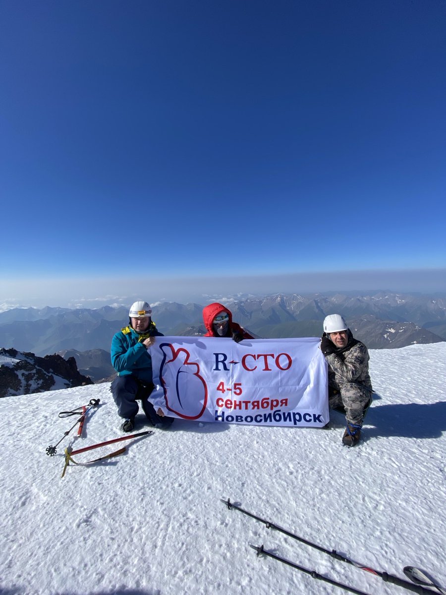 On top of Kazbek, Georgia, 5,033m with Russian CTO club yesterday. Flag with upcoming CTO meeting in Siberia in September. Larionov Anatolii, Evgeny Kretov