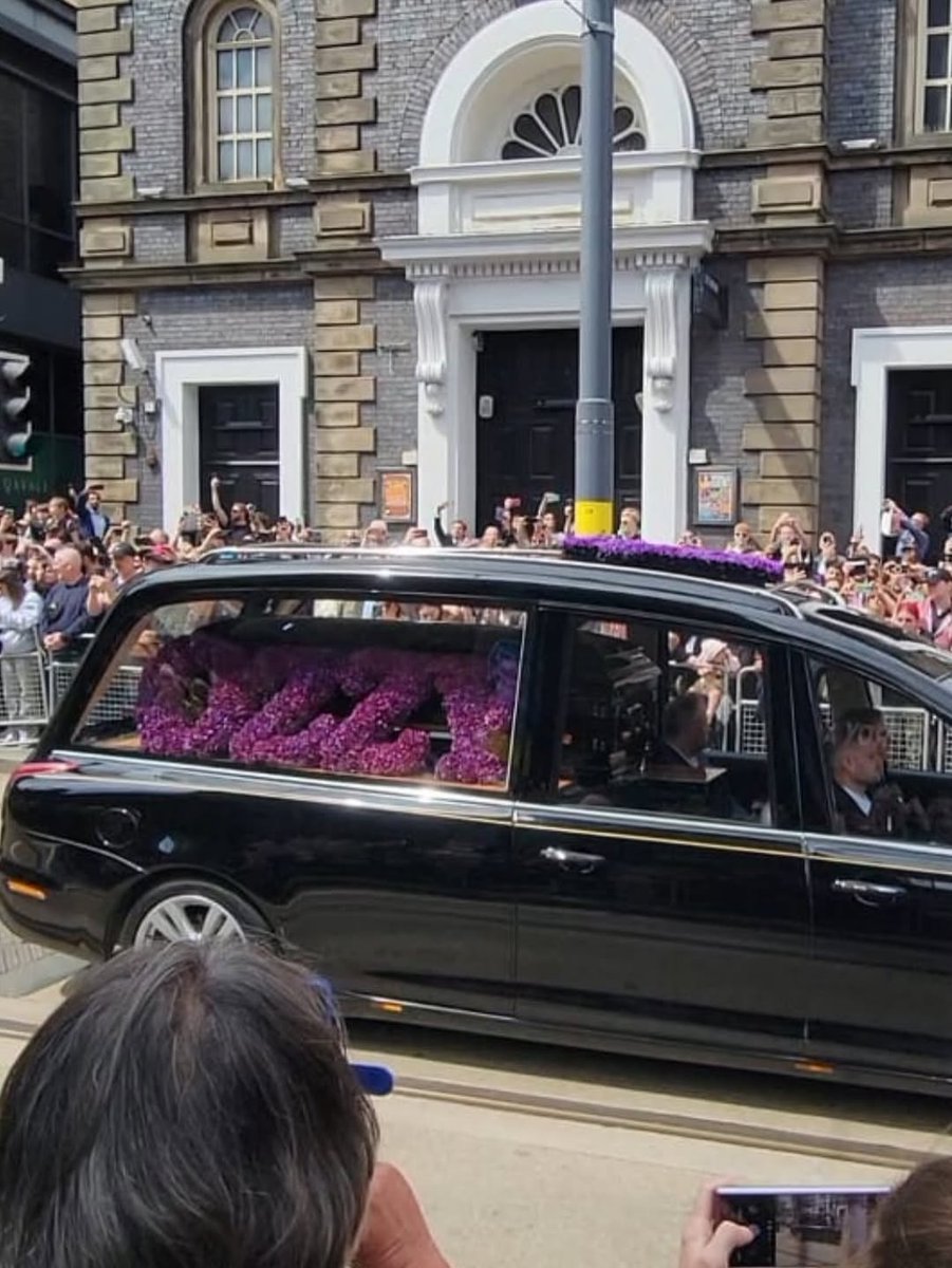 💜 OZZY OSBOURNE's funeral procession passes through his home town of Birmingham. Rest in peace, Prince of Darkness.⁠