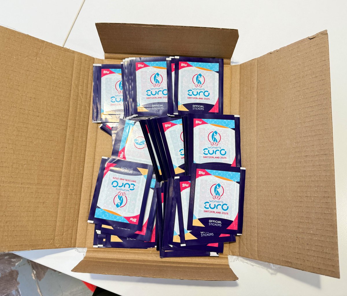 Has anyone been collecting <a href="/Topps_UK/">Topps UK</a> Euro 2025 stickers with their kids? We have all these packs in the <a href="/FourFourTwo/">FourFourTwo</a> office and I’d love to donate them to a young fan looking to complete their sticker book