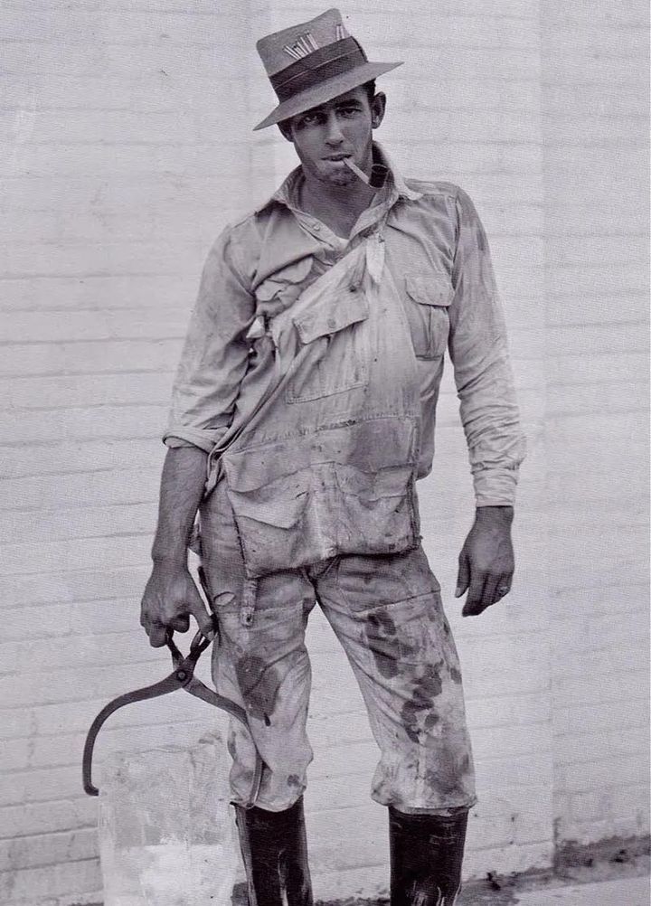An ‘Ice Man’, delivering a 25lb block of ice in 1928, Houston, Texas.