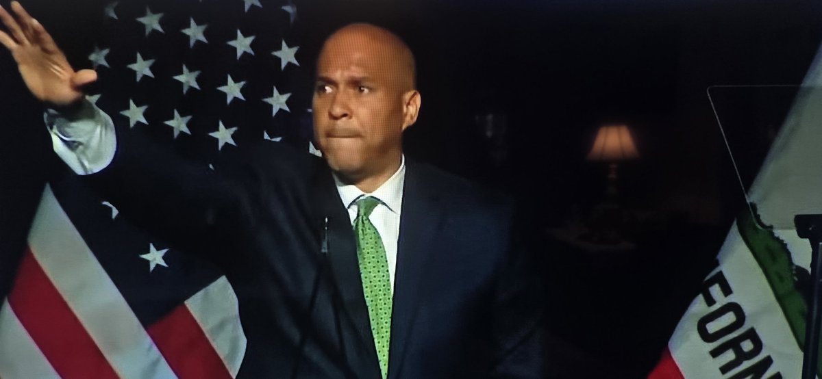 jeff3587's tweet image. Is this Cory Booker doing his Nazi salute with the American flag in the back in the background? This is as bad as burning an American flag!
Democrats are disgusting!