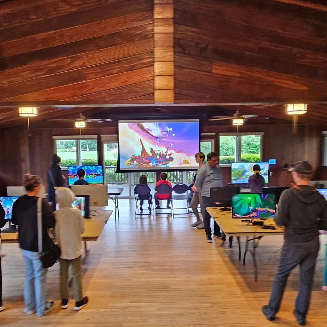 mimztechgroup's tweet photo. Throwback to April when we teamed up with Navigators USA and transformed their hall into a full-on gamer’s paradise! 
We brought 16 game stations, two epic TV setups featuring Mario Kart 8 and Street Fighter, plus a massive projector lighting up the room with Super Smash Bros. https://t.co/STdhUwfej9