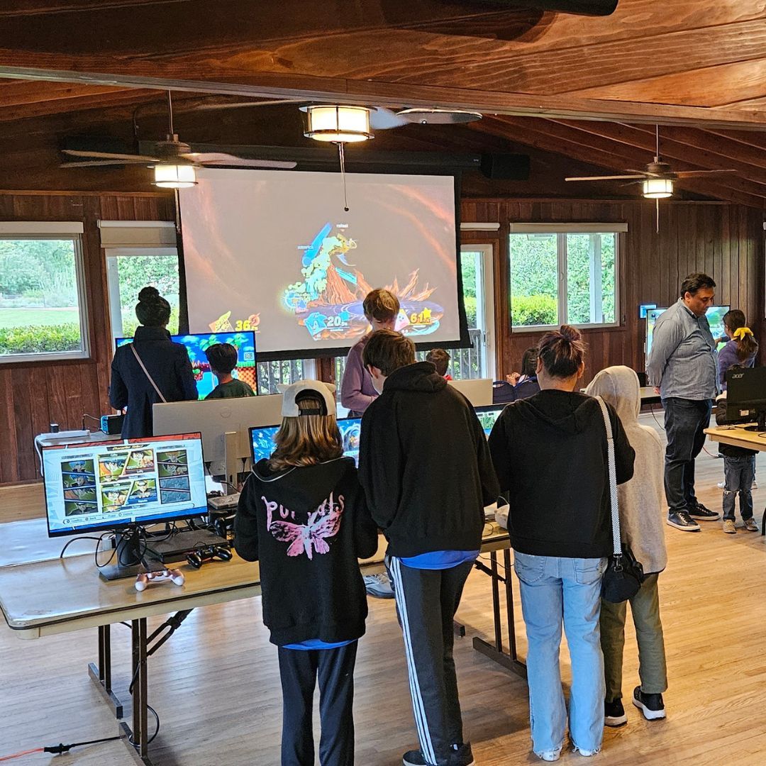 mimztechgroup's tweet photo. Throwback to April when we teamed up with Navigators USA and transformed their hall into a full-on gamer’s paradise! 
We brought 16 game stations, two epic TV setups featuring Mario Kart 8 and Street Fighter, plus a massive projector lighting up the room with Super Smash Bros. https://t.co/STdhUwfej9