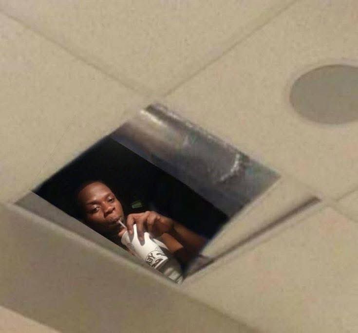 Me watching my mom tell the visitors my business :