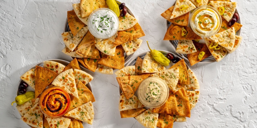 Craving a snack? Dip in Something Fresh at Taziki's! Our fresh, handcrafted dips come with seasoned pita chips for the perfect Mediterranean bite! Visit us today or order online to try our delicious dips! togoorder.com/web?id=188&#!/
#Dips #Hummus #SpicyHummus #TazikiDip #WhippedFeta