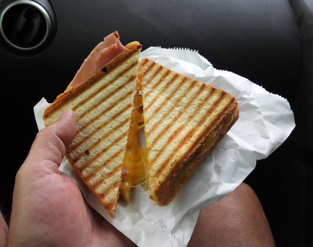 A year ago today, I had filled up my customer loyalty card for the Loch Oich Food Co. and got this delicious, free, ham 'n' cheese toasty! It's right by the well of the seven heads, and I just can't resist taking pix every time we stop there.