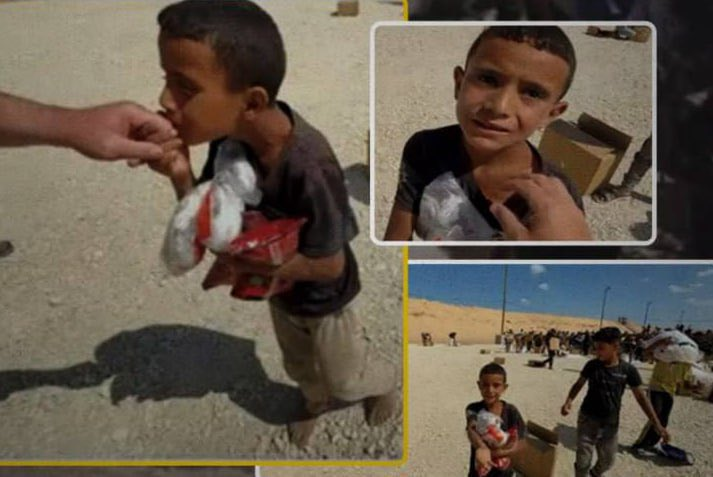 What kind of monster kills a child like this? Look at him, barefoot, dusty, still clutching the food he just received, still showing gratitude with a kiss... And yet, he’s one of over 22,000 innocent children slaughtered in cold blood by the Israel-USA alliance. This isn’t war.
