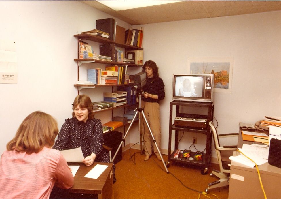 One of the many ways we help job candidates prepare for their job search is through practice interviews, as seen here. Hairstyles and technology may have changed, but the value of practicing before the real deal is still a key to finding success.