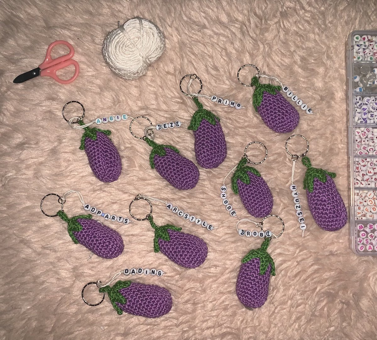 gmonad! talong update! 🍆 
i've added names to the keychains so we know exactly whose 'talong' is whose 🤪

still have 30 talongs left to give away for the Filipinads meetup, so if you’re going and want a cute talong keychain, please drop your name below! 💜

<a href="/monad/">Monad ⨀</a>