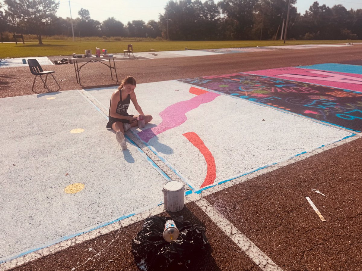 You can catch members of the CA Class of 2026 painting their parking spaces early in the morning or late in the evening to beat the summer heat. Senior year is almost here! 🖤💛🎓