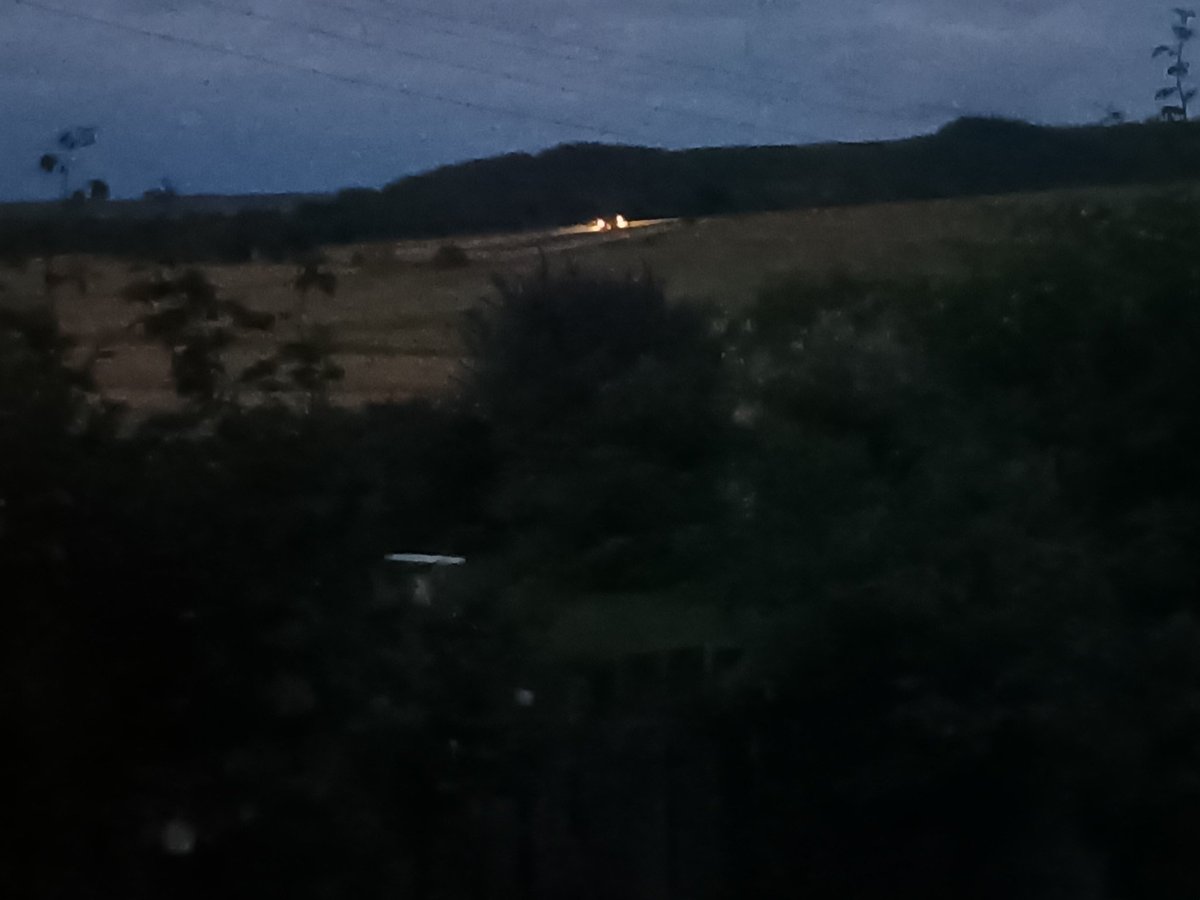 The blurred lights in the distance are a farmer still working. As <a href="/ClarksonsFarm1/">ClarksonsFarm</a> has shown, it's not a 9-5 job and not one farmers get rich from.  Yet <a href="/UKLabour/">The Labour Party</a> still think they do. The view from my garden BTW
