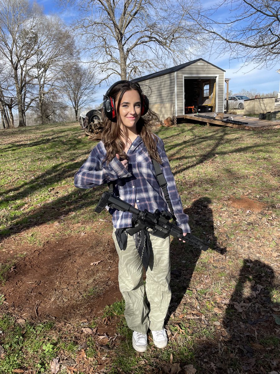 Teaching my granddaughter how to shoot rifles.