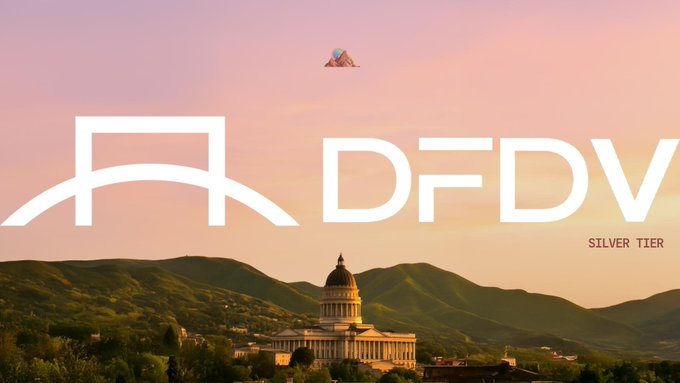 DeFi Development Corp (DFDV) Silver Tier sponsorship at mtndao with a scenic backdrop featuring a capitol building and mountains