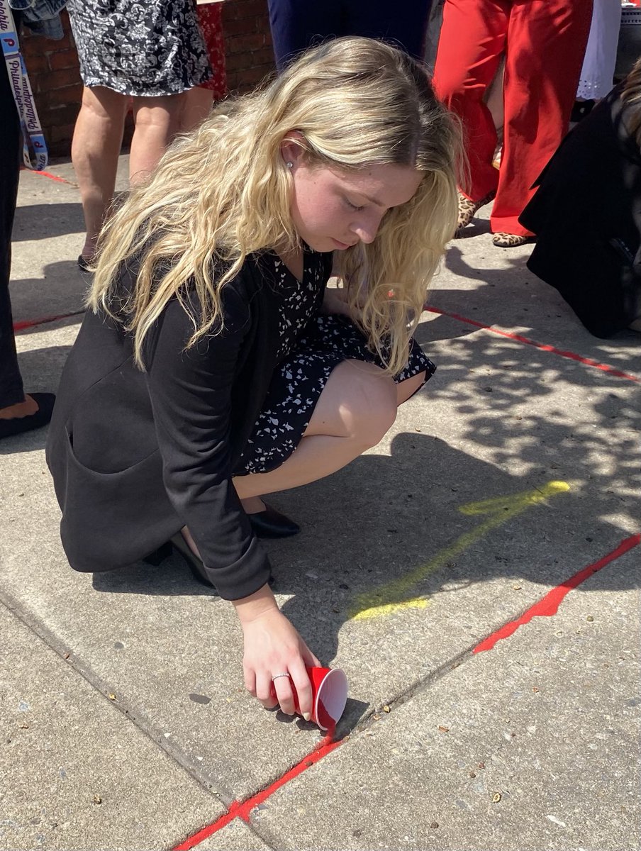 MontcoCourtNews's tweet image. Mackenzie Iocona, supervising litigation assistant at #MontcoPa District Attorney’s Office, took part in raising awareness about human trafficking &amp;amp; honoring those who have fallen through the cracks in society by filling sidewalk cracks with red sand as part of #RedSandProject