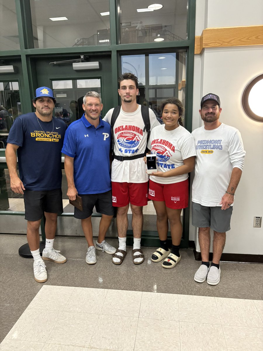 Brooklyn and Jackson representing Piedmont one last time on the mat