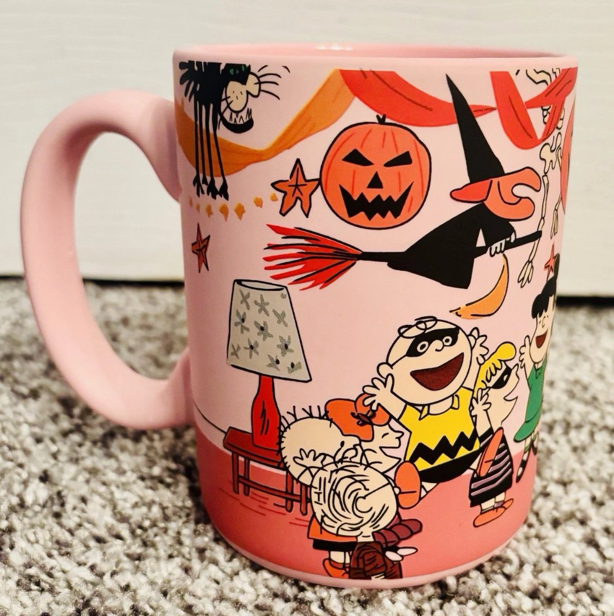 Look at this hot pink Peanuts halloween mug!