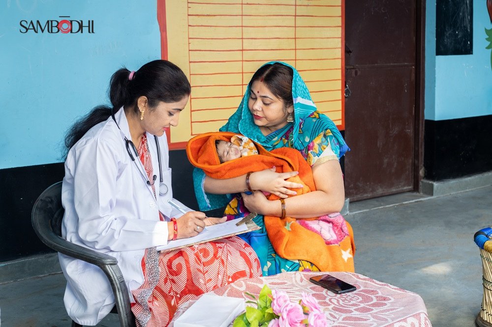 sambodhi's tweet photo. In rural India, steady progress in maternal and child health is being powered not just by #policies, but by #ASHAs, #nurses, and #mothers who bring care to life every day, often beyond what the #data alone can capture.

But what does it really take to make #care feel #accessible, personal, and lasting in these communities?

Find out in this blog: https://t.co/yYgIVzJEj9

#Healthcare #RuralIndia #MaternalHealth #ChildHealth