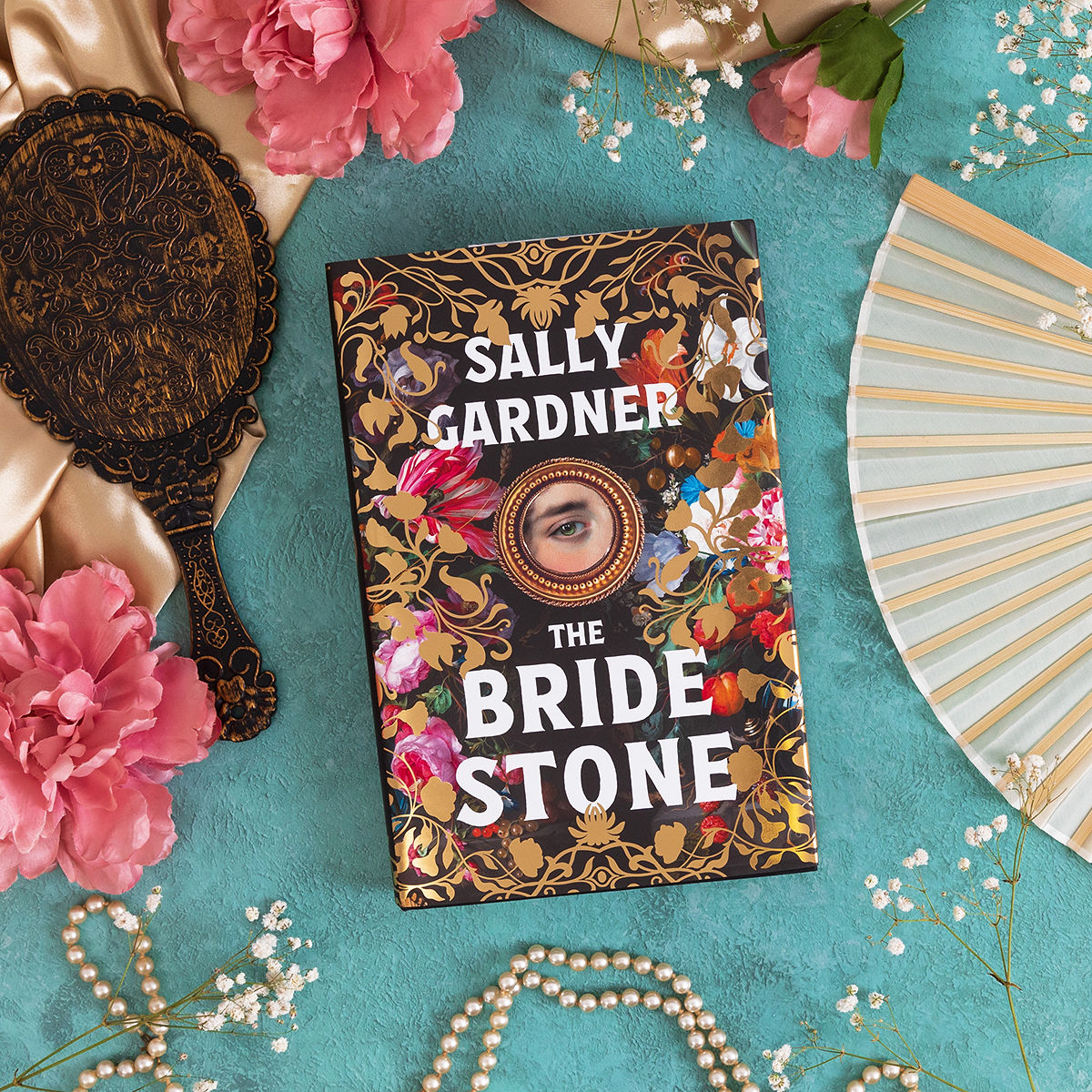 Happy publication day to Sally Gardner and #TheBrideStone! 
An estate on the line. A marriage of convenience. A bride with a hidden past… 
Available in eBook and HB now: amzn.eu/d/h8jFNzH