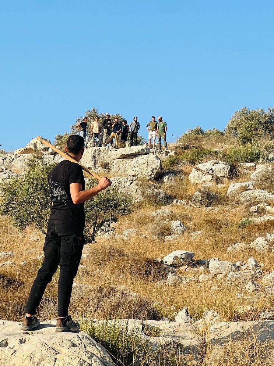A lone Palestinian stands his ground against Jewish settler terrorists near Kafr Qaddum, east of Qalqilya. This is life for Palestinians in the West Bank. Neighbours from hell with very bad intentions.