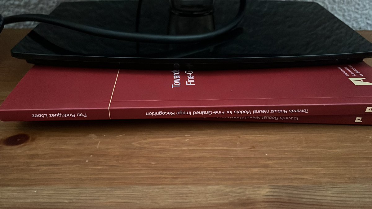 When you go back home and find your parents raise their monitor with your PhD thesis 😅