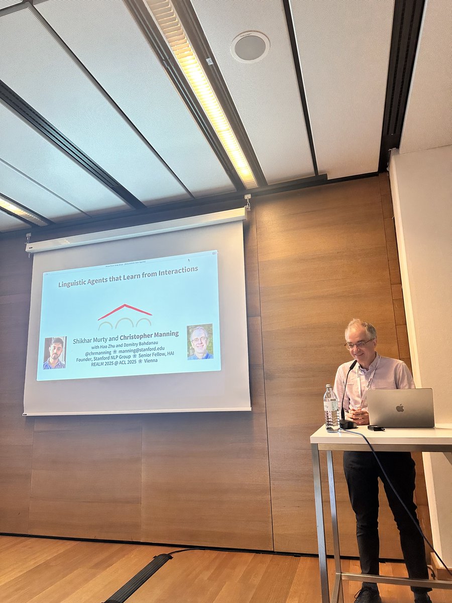 The crowd was so huge that the workshop had to be broadcast in the hallway outside 🥹 I hope next time we get a bigger room (and more chairs outside too) so people don't have to stand for so long whether inside or out.

Chris Manning gave an amazing thoughtful talk about how can