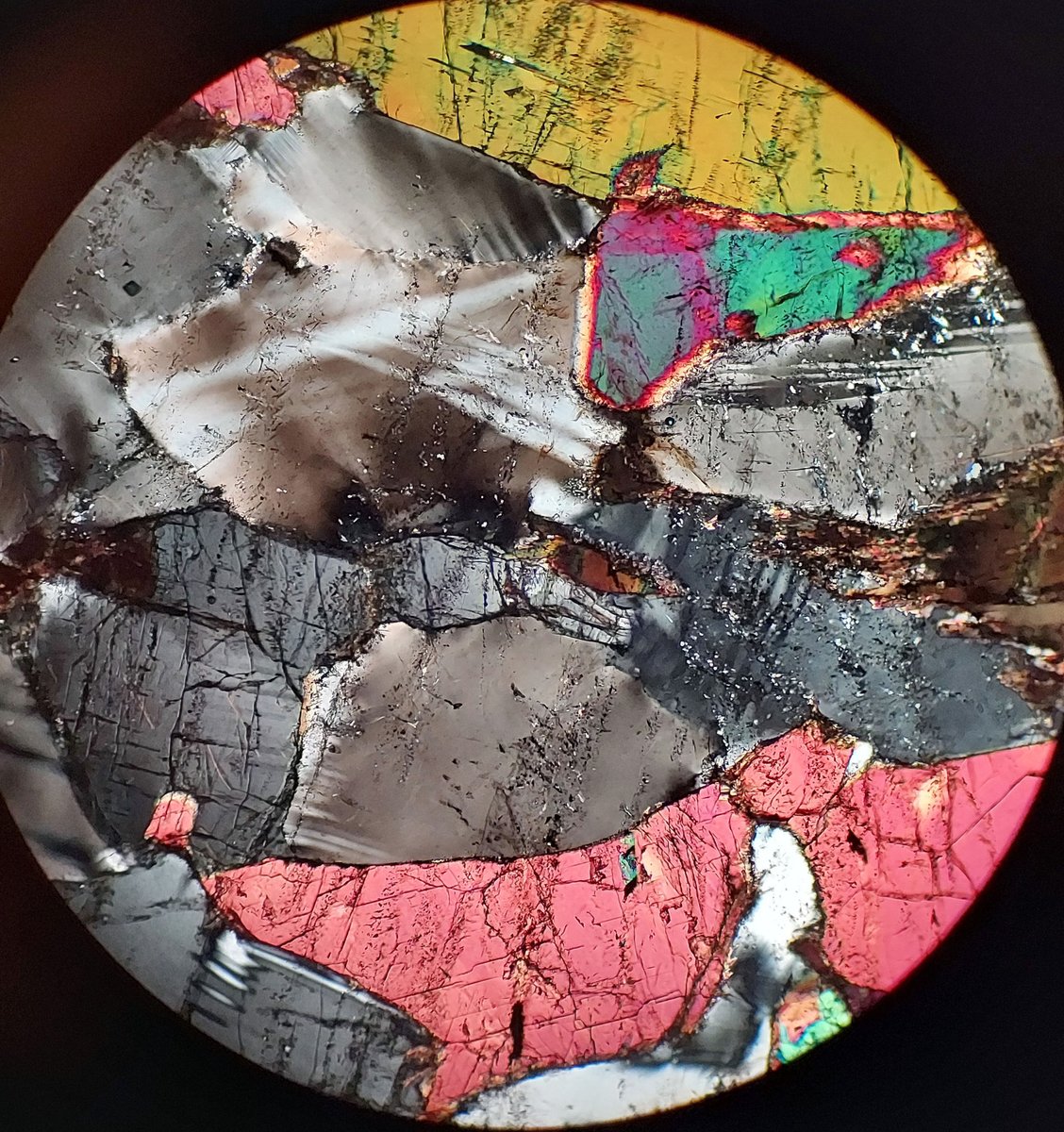 Mineralogical Society of America (@minsocam) on Twitter photo Thin Section Thursday!
Colorless plag and brown to orange hnbl. But opx occurs in the SW quadrant. XP: the hnbl has colorful interference colors, while the opx and plag are gray to white.  Contributed by Matt Kohn.  #thinsectionthursday
contribute: akoziol1 at udayton dot edu. Thin Section Thursday!
Colorless plag and brown to orange hnbl. But opx occurs in the SW quadrant. XP: the hnbl has colorful interference colors, while the opx and plag are gray to white.  Contributed by Matt Kohn.  #thinsectionthursday
contribute: akoziol1 at udayton dot edu.