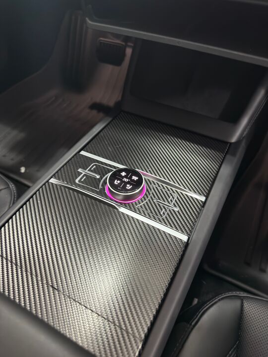 Ken did an all black carbon fiber interior upgrade: "Looks amazing, high quality, easy to apply. Totally transforms the look of the interior."