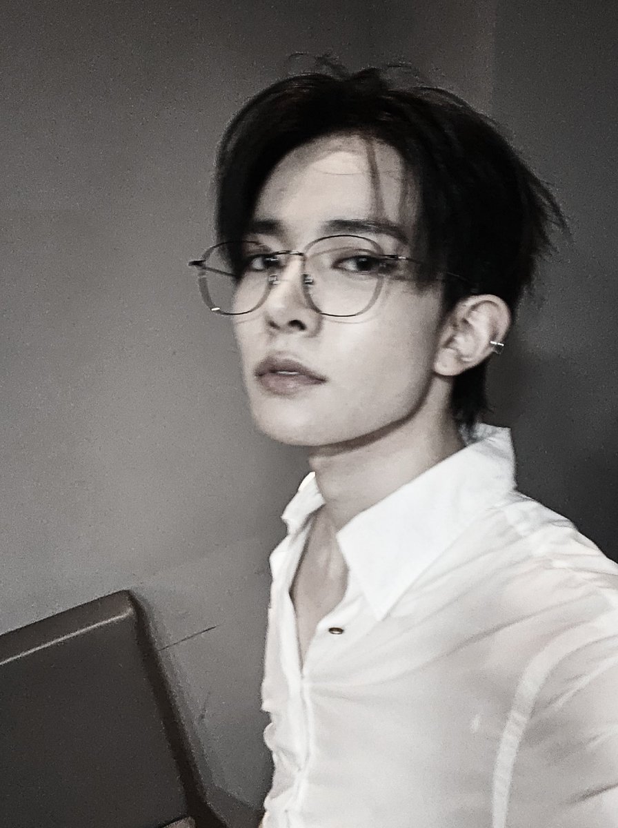“. . .blurred edges, sharp gaze. white shirt, darker thoughts. the kind of night where silence speaks louder than words and the man in the mirror doesn’t flinch.”