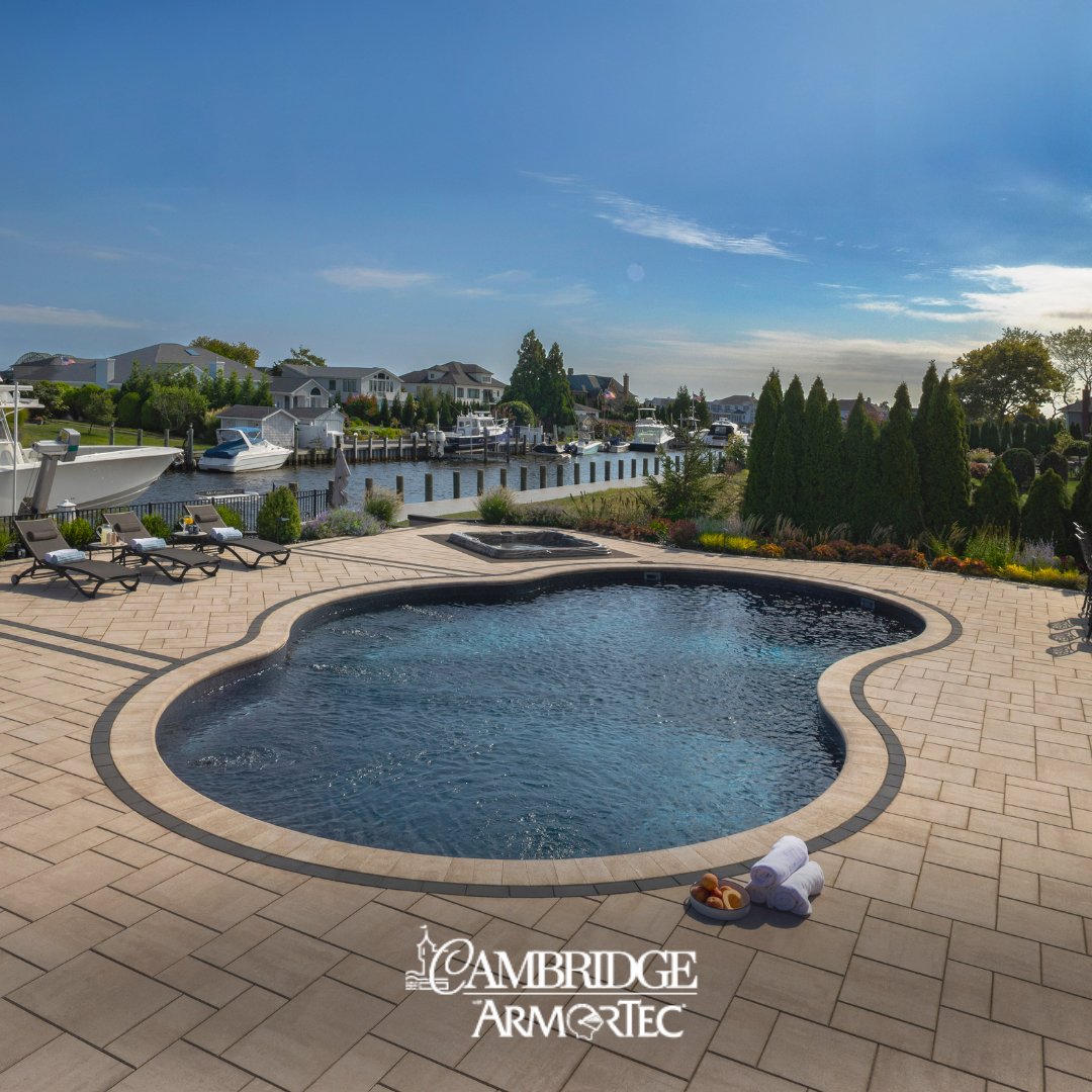 Where will your dream patio take you?
Whether you're watching the boats roll in, hosting under a tiki hut, or lounging poolside with a view, Cambridge Pavers make every outdoor moment unforgettable. 
Explore more at cambridgepavers.com

#CambridgePavers  #OutdoorDesign