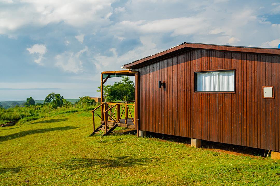 More than 12 of these buildings can be found in some places in Uganda  and here is why👇

This building is 87 sqm without the extended deck and pergola.

It was completely crafted in sustainably sourced wood and so no negative impact was done on forest resources . It has a Gable