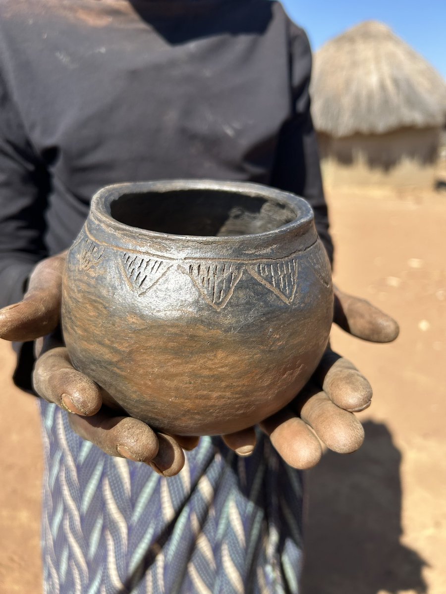 Clive Mitchell 💙 (@clivebgs) on Twitter photo Graphite polished pot made by Dorothy from Chimwele-Agripa. The <a href="/BritGeoSurvey/">British Geological Survey</a> <a href="/ZambiaMines/">Ministry of Mines and Minerals Development | GRZ</a> <a href="/CBU_ZM/">The Copperbelt University</a> team visited the source of the #graphite in gneiss occurring just south of the village. Great to learn this traditional pottery skill is being handed down to the next generation. Graphite polished pot made by Dorothy from Chimwele-Agripa. The <a href="/BritGeoSurvey/">British Geological Survey</a> <a href="/ZambiaMines/">Ministry of Mines and Minerals Development | GRZ</a> <a href="/CBU_ZM/">The Copperbelt University</a> team visited the source of the #graphite in gneiss occurring just south of the village. Great to learn this traditional pottery skill is being handed down to the next generation.