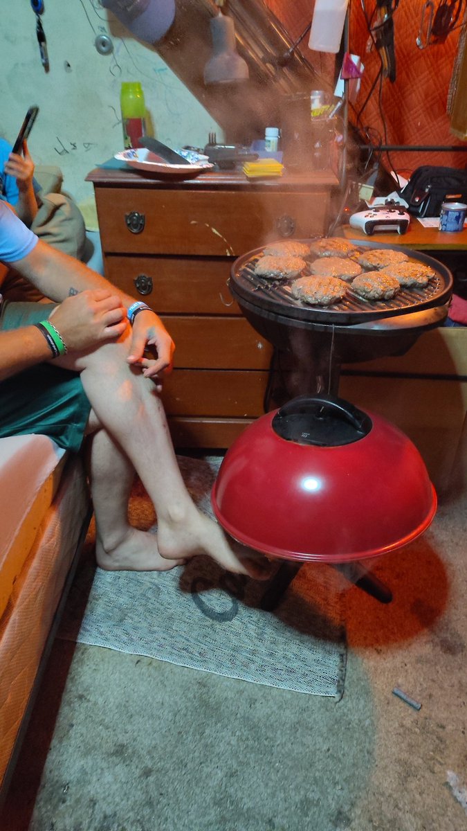 my father is grilling burgers in his bedroom???