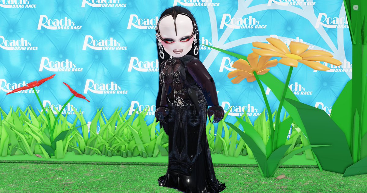 A beautiful bald orb is seen gracing the Roach's Drag Race green carpet. It's Gorka!

#RoachsDragRace