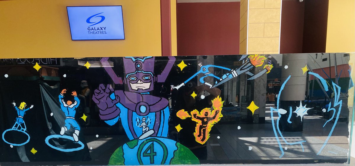 Beautiful custom glass window art at Galaxy Theatres Boulevard Mall.