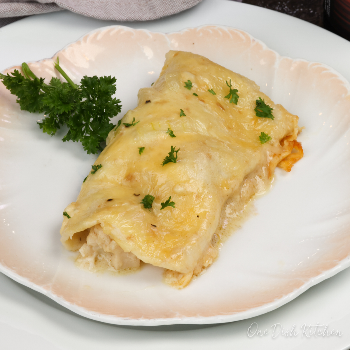 These single serving chicken enchiladas are made with tender shredded chicken, a creamy homemade sauce, and melted cheese wrapped in soft flour tortillas. They’re easy to make and bake in about 30 minutes. onedishkitchen.com/chicken-enchil…