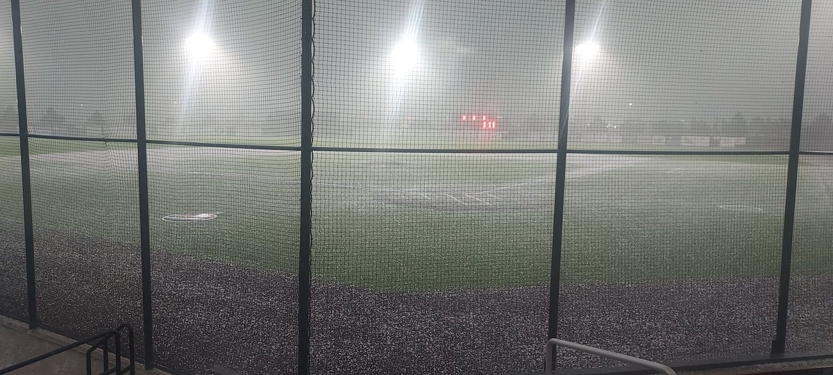 Hail covering Powers Field! Game time for <a href="/post6baseball/">Post 6 Baseball</a> vs. Gillette is now 6 pm.