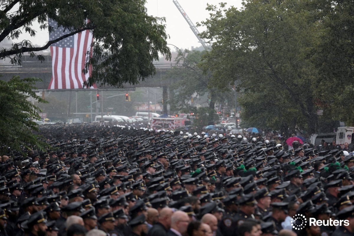 corinne_perkins (@corinne_perkins) on Twitter photo Pollice officers gather for the funeral services for New York City Police Department (NYPD) officer Didarul Islam, killed during a mass shooting event at a midtown Manhattan office tower on July 28, in the Bronx borough of New York City. Photo by <a href="/JeenahM/">Jeenah Moon</a> Pollice officers gather for the funeral services for New York City Police Department (NYPD) officer Didarul Islam, killed during a mass shooting event at a midtown Manhattan office tower on July 28, in the Bronx borough of New York City. Photo by <a href="/JeenahM/">Jeenah Moon</a>